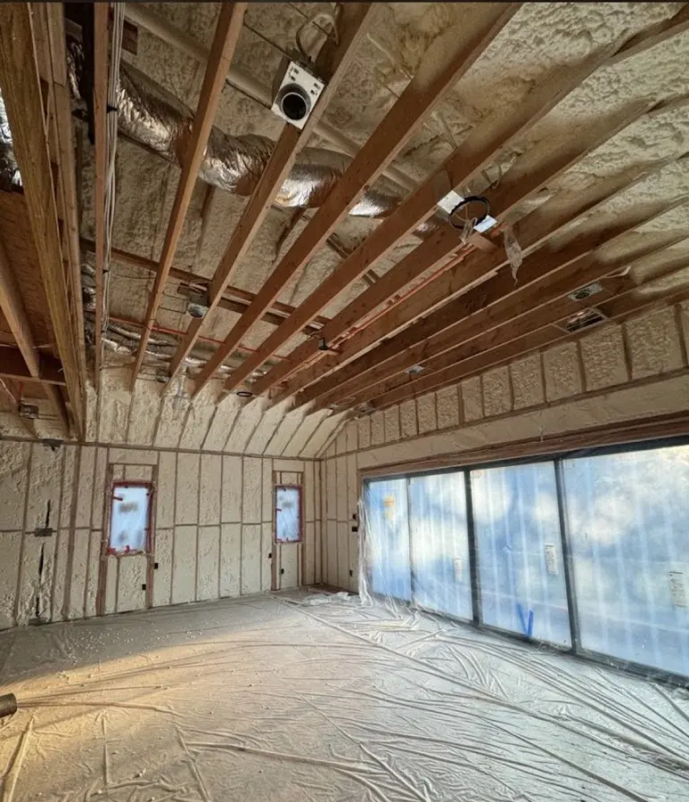 Interior walls and ceiling insulated with spray foam during new construction in Hernando